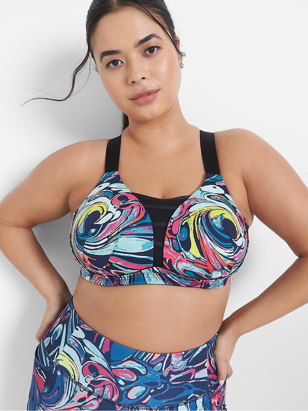 LIVI sports bra for medium impact workouts, wide adjustable straps. Size 46B